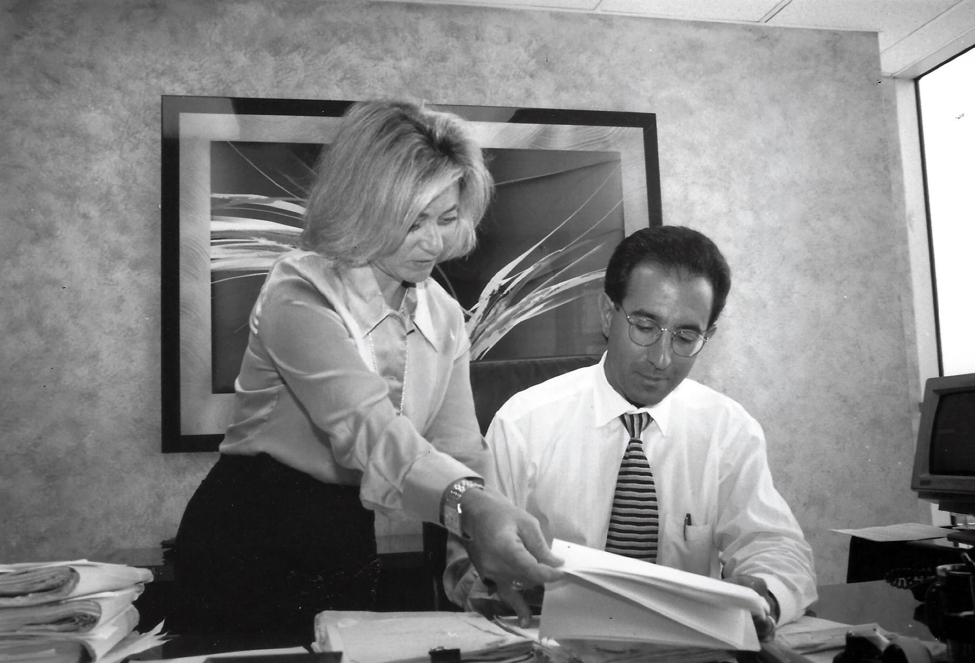 Nick & Lisa working on debt collections case in the 1990's
