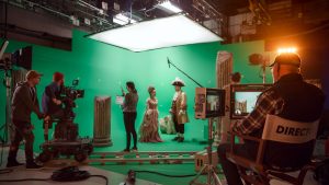 movie shoot set with actors in costumes