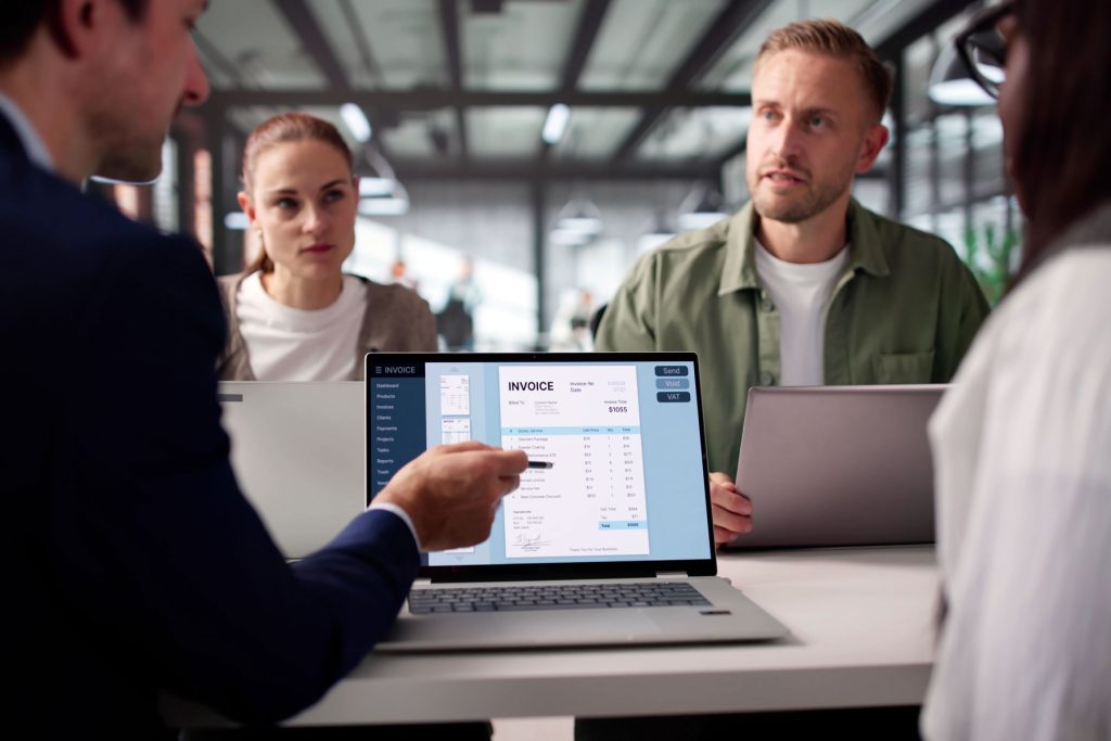 technology companies and invoicing, laptop with an invoice on the screen